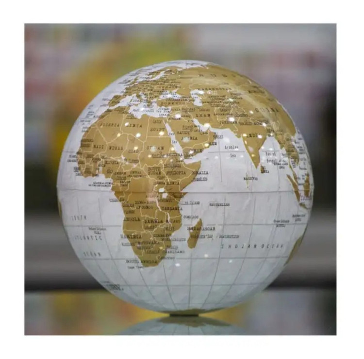 کره زمین چرخان رنگ سفید طلایی